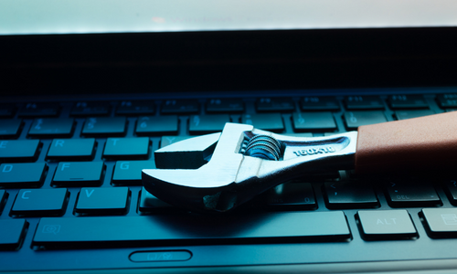 managed_services_repair_keyboard_wrench